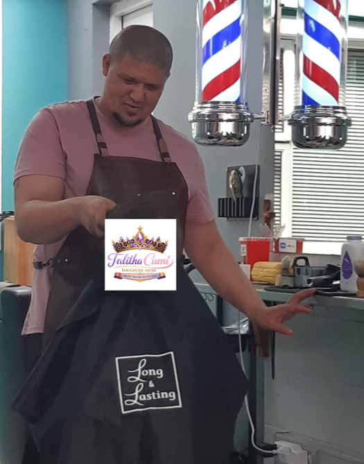 Craig, the Strandfontein Barber, supporting Thalitha Cumi